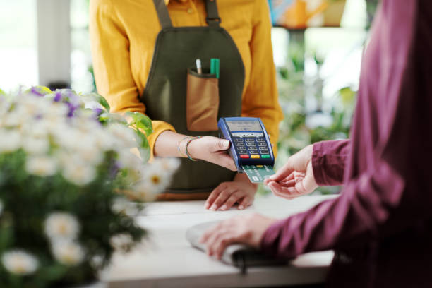 Customer paying with a credit card stock photo