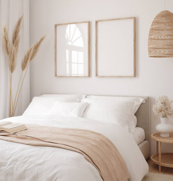 ベッドルームインテリアの背景にモックアップフレーム、明るいパステルカラーの部屋 - poster bed ストックフォトと画像