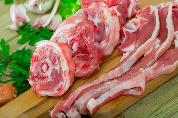 istock Raw lamb meat with vegetables 1404827035