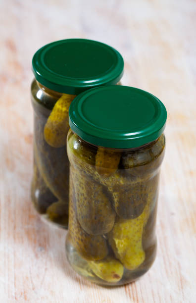 istock Glass bottle of marinated cucumbers 1404827208