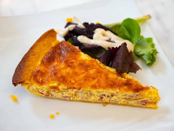 istock Slice of quiche Lorraine filled with bacon 1404827413