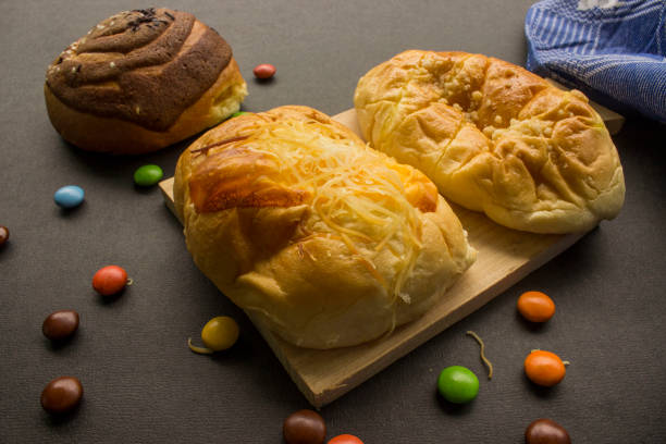 istock Baking Homemade bread Pastry chocolate, isolated on black background suitable for breakfast 1404827543