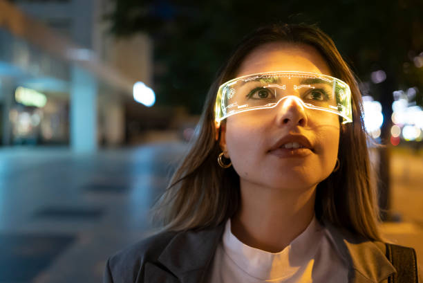 Young woman with augmanted reality glasses stock photo