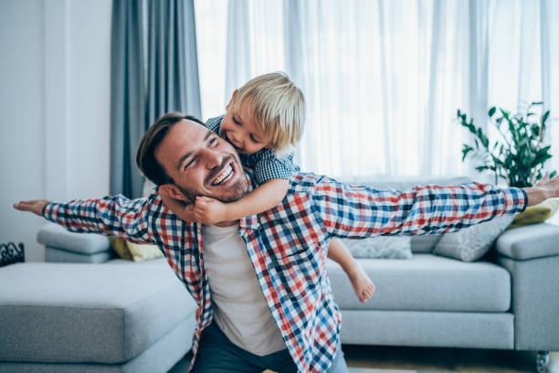 istock Father and little son at home. 1404832216