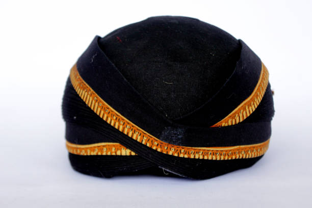 istock blangkon hitam or black blangkon a traditional hat Javanese men. isolated on white background 1404832331