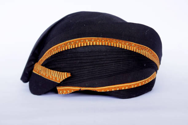 istock blangkon hitam or black blangkon a traditional hat Javanese men. isolated on white background 1404832332