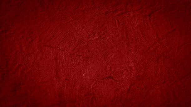 istock Abstract red old aged retro vintage painted paper concrete cement facade plaster wall texture background 1404834810