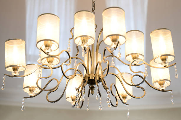 istock Beautiful classic chandelier hanging on the ceiling. 1404836366