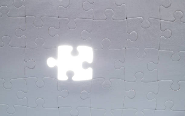 istock The last piece of puzzle 1404839008
