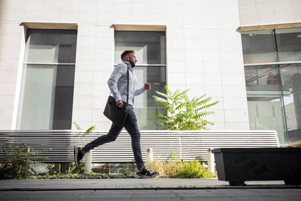 istock Businessman is running to work 1404839080
