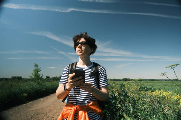 istock Middle-aged woman is passing time in hiking 1404843754