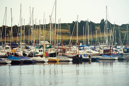 Colorful fishing boats in Atlantic Canada on the Bay of Fundy, St. Martins, New Brunswick during low tide