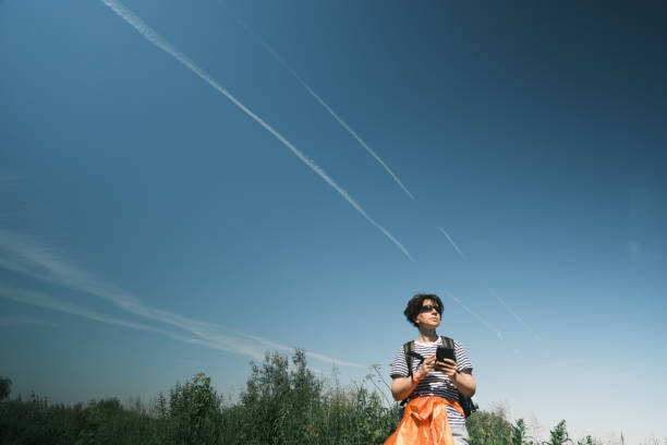 istock Middle-aged woman is passing time in hiking 1404844016