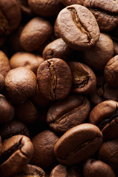 istock Roasted coffee beans macro close up background 1404844861