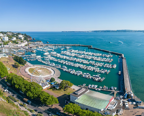 Boats in Torquay Harbour and Torbay Coastline