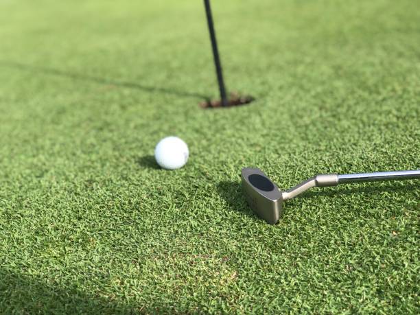 istock Putter and ball on the green 1404845463