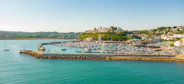 istock Torquay Harbour and Houses on a hill 1404845465