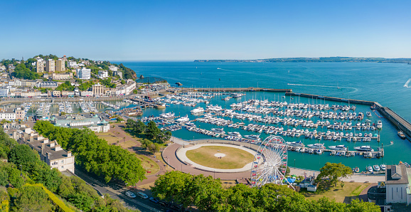 Boats in Torquay Harbour and Torbay Coastline