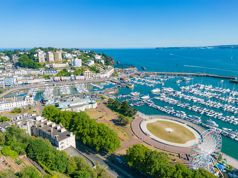 Boats in Torquay Harbour and Torbay Coastline
