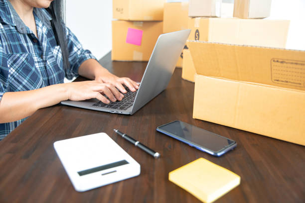 istock Woman taking orders of customers products 1404848295