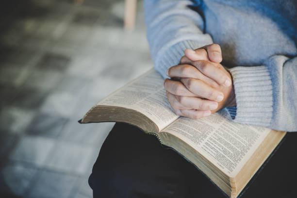 istock Prayer woman hand 1404848423