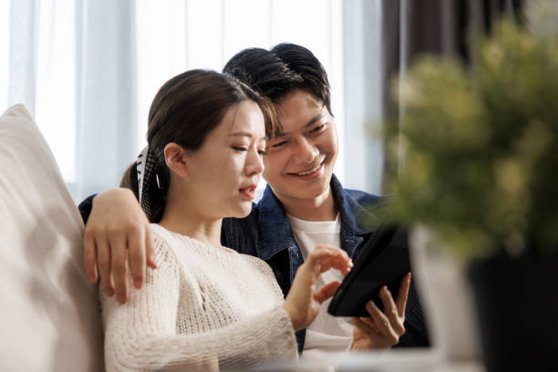 istock Asian couples are using tablet computers to shop online 1404849608