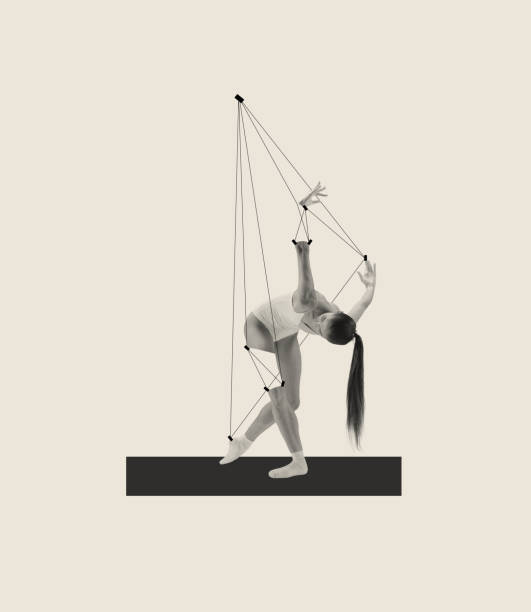 istock Contemporary art collage with young ballerina performing with drawn strings like puppet isolated over grey background 1404849694