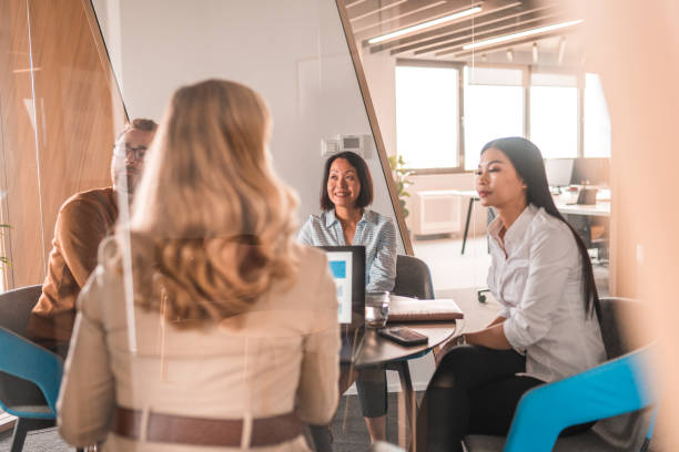 istock Multi-Ethnic Creative Agency Coworkers Brainstorming In A Meeting 1404849849
