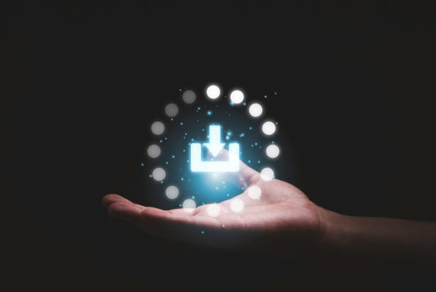 istock Hand holding virtual download sign symbol for technology transformation and sharing concept. 1404851468