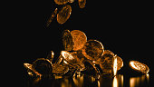 Golden and shiny Ancient Roman Coins falling on black background 3d render