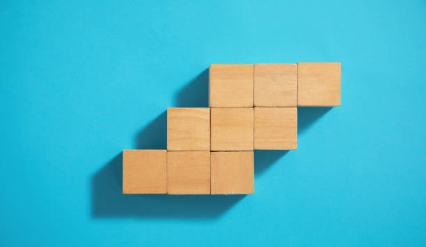 istock Wooden cubes on the blue background. 1404852832