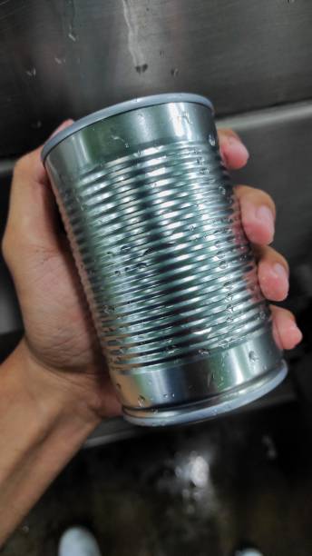 istock A man holding canned drink 1404854087