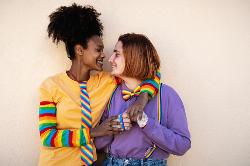 Happy women gay couple having tender moments outdoor - LGBTQ and love concept