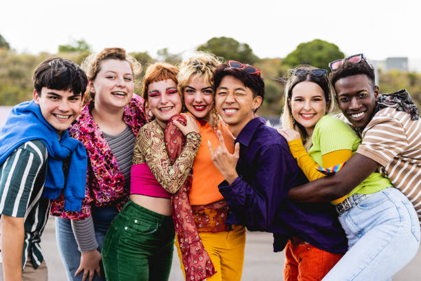 Happy young diverse friends having fun hanging out together - Youth people millennial generation concept Happy young diverse friends having fun hanging out together - Youth people millennial generation concept lgbtqia people stock pictures, royalty-free photos & images