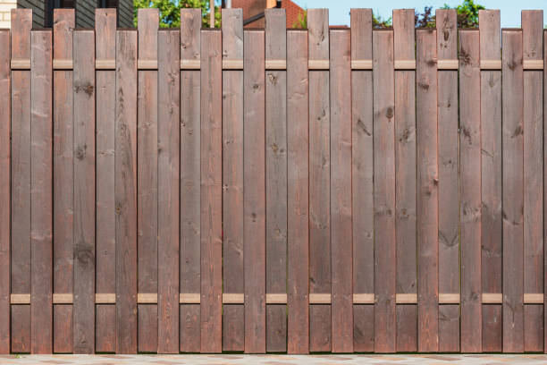istock Metal fence by the house. 1404856412