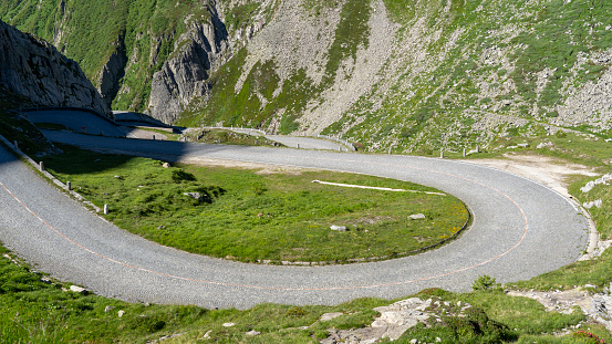 San Gottardo, Switzerland. Amazing view of the bends of the pave road leading to the mountain pass. Grand tour. Historical route