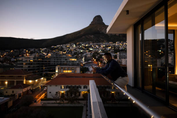 African businessman in luxury city hotel apartment
