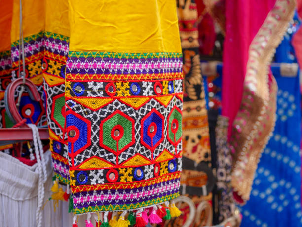 istock Various dresses hanging at garment shop. 1404862642
