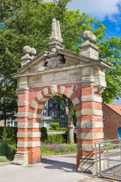 istock Historic red brick gate in the harbor of Emden 1404864197