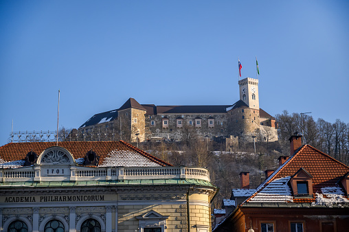 Landscape view on the Ljubljana Castle with the historical buildings of Ljubljana at winter