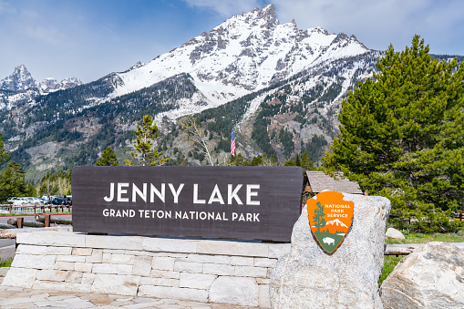 Jackson, WY - June 3, 2022: Welcome sign at Jenny Lake in Grand Teton National Park.  Jenny Lake is one of the most popular locations in the park.