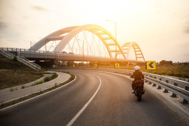 istock Motorcyclist in a city 1404873393