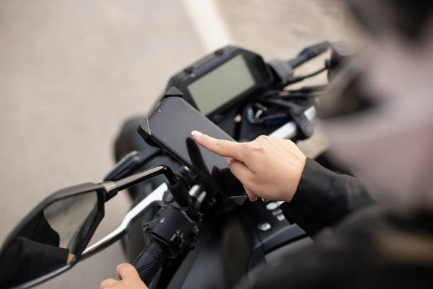 Mobile app on a motorcycle stock photo