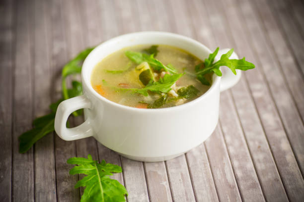 istock summer light soup with oatmeal and arugula in a plate 1404874186