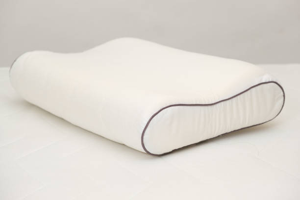 istock Orthopedic pillow made of memory foam on a white background. 1404874637