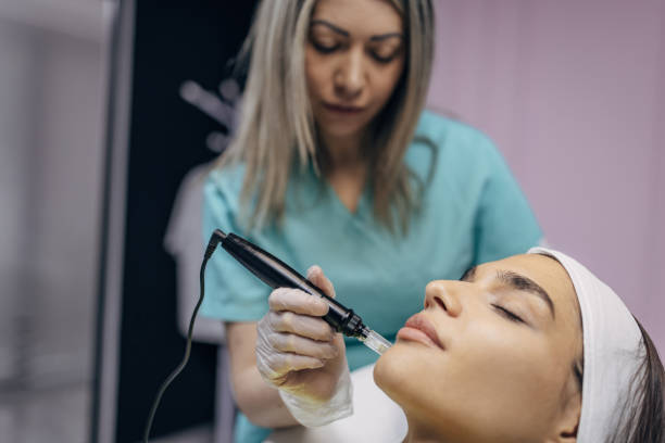 istock Facial treatment at beauty salon 1404876371