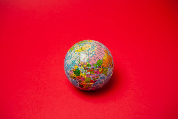 istock a planet ball in a red background 1404878136