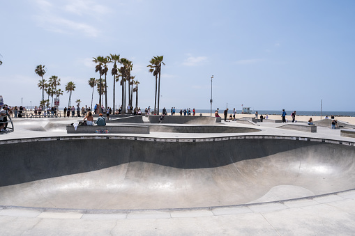 Los Angeles, USA - May 8th, 2022: The iconic Venice Beach Skatepark late in the day.