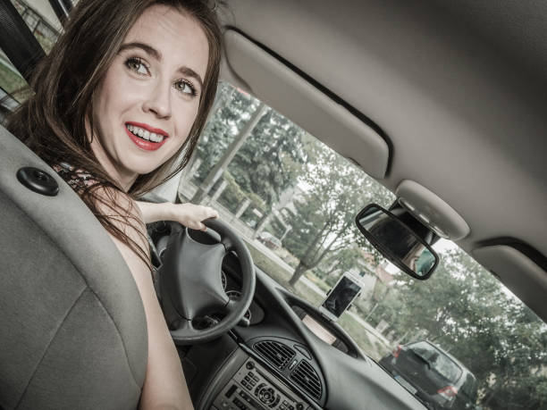 istock Woman driving a car 1404878713