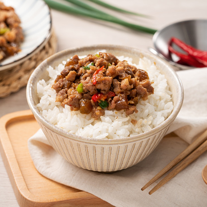 Fried minced pork with pickled cucumber on rice named GUA ZI ROU FAN, delicious traditional food in Taiwan.